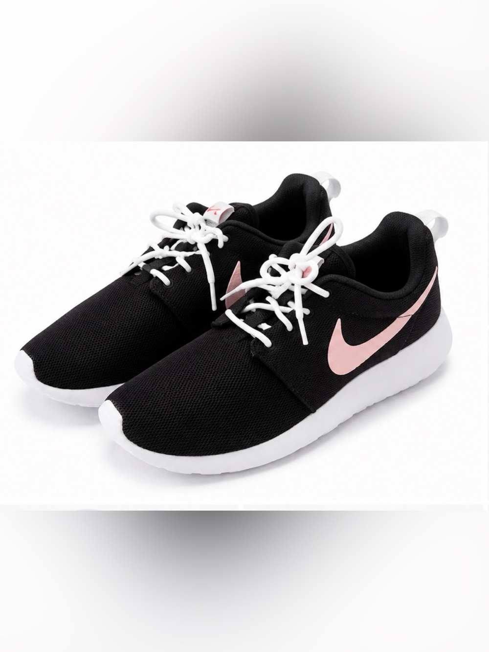Nike Women's Black Runners with Pink Swoosh and White Sole